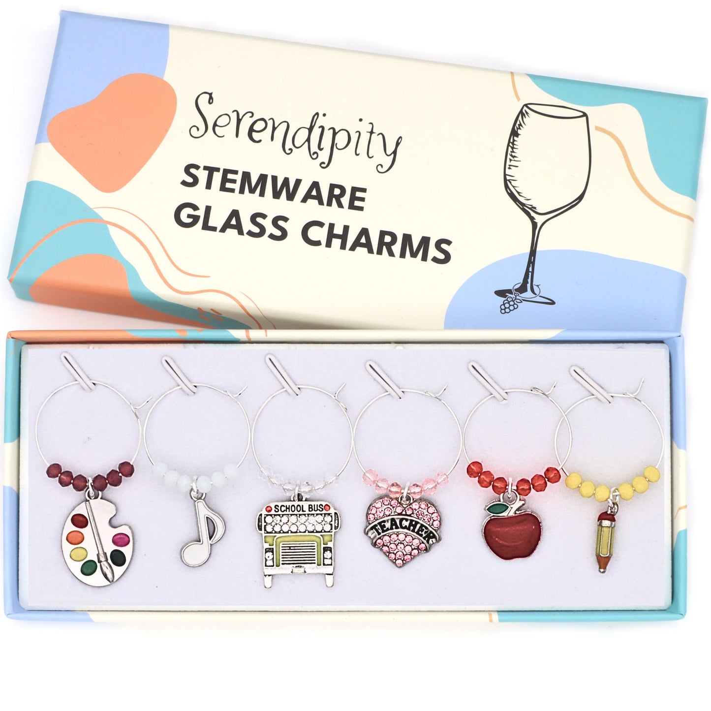 A set of Favorite Teacher Wine Glass Charms on the brand's box.