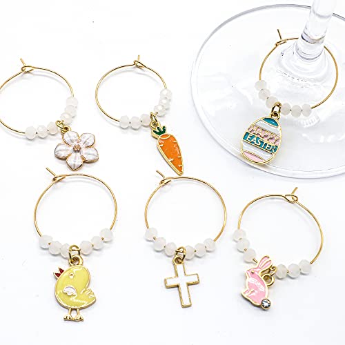 A set of Easter Wine Glass Charms featuring Bunny, Egg, Cross, Carrot, Chick, and Daisy on a white surface.