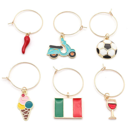 Italian Wine Charms set includes Italian Flag, Vespa, Soccer Ball, Gelato, Red Wine Glass, and Italian Horn on a white surface.