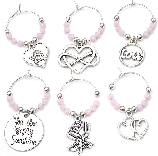 Valentine's Day Wine Charms set of 6 silver charms with pink beads: Cupid Heart, Infinity Heart, Love, You Are My Sunshine, Rose and Double Hearts