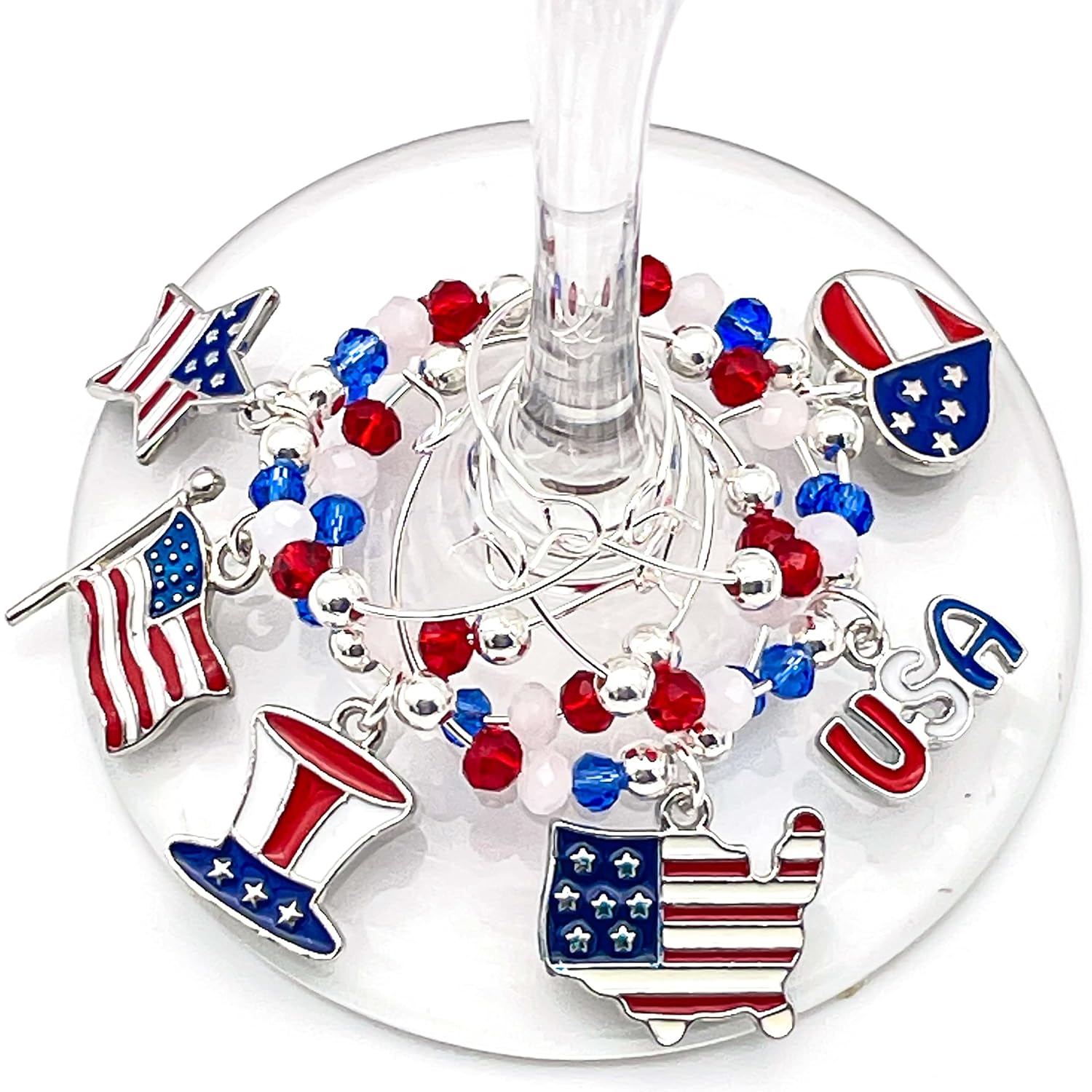 USA Wine Charms hooked on the glass.