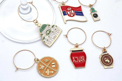 Serbian Wine Charms on a white surface.