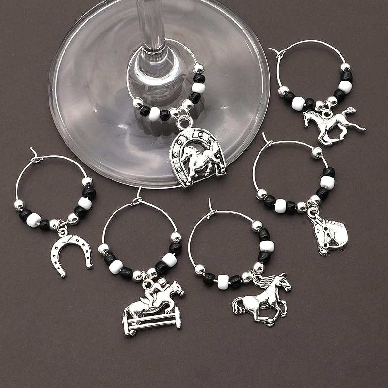 Horse Wine Glass Charms on a Brown Surface.