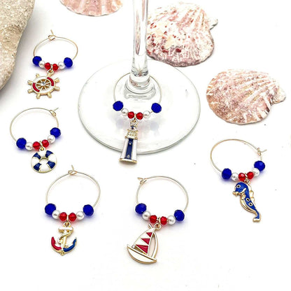 Nautical Wine Charms with Shells on a white surface