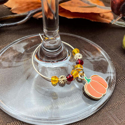 Thanksgiving Wine Charms hooked on the glass.