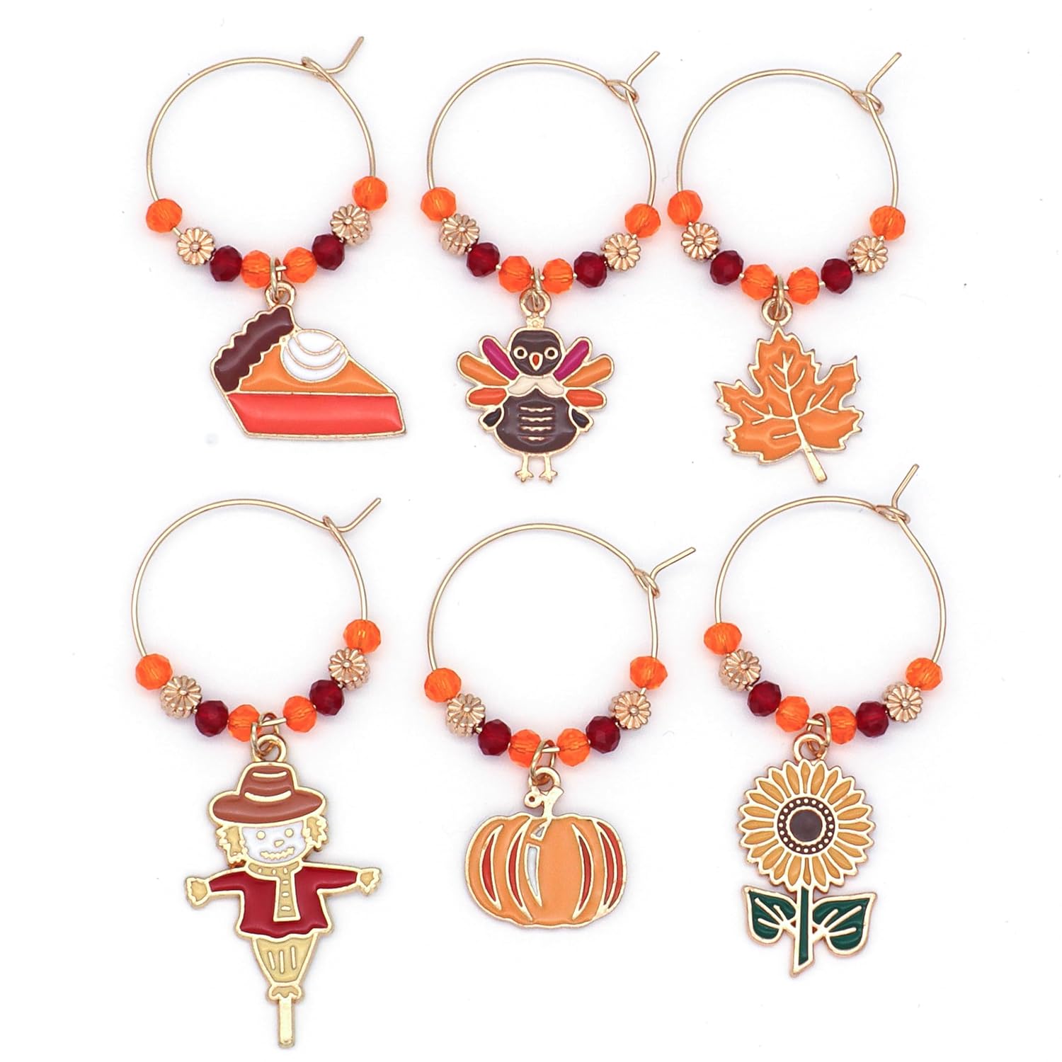 A set of Thanksgiving Wine Charms on the white surface.