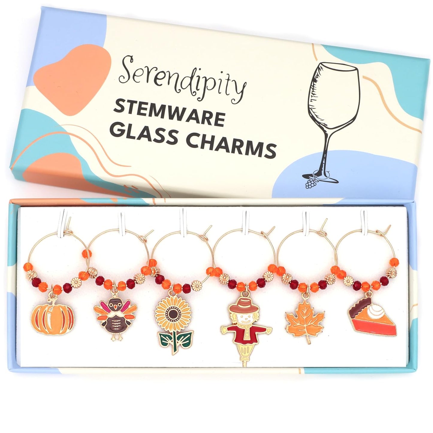 A set of Thanksgiving Wine Charms in the brand's package.