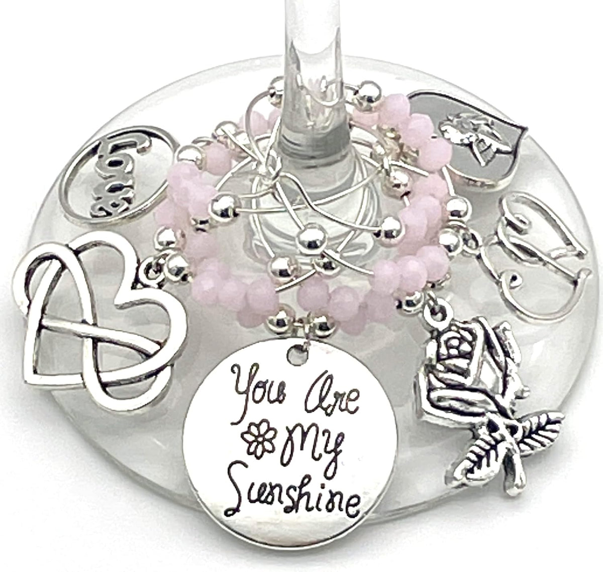 Valentine's Day Wine Charms set of 6 silver charms with pink beads hooked on a wine glass