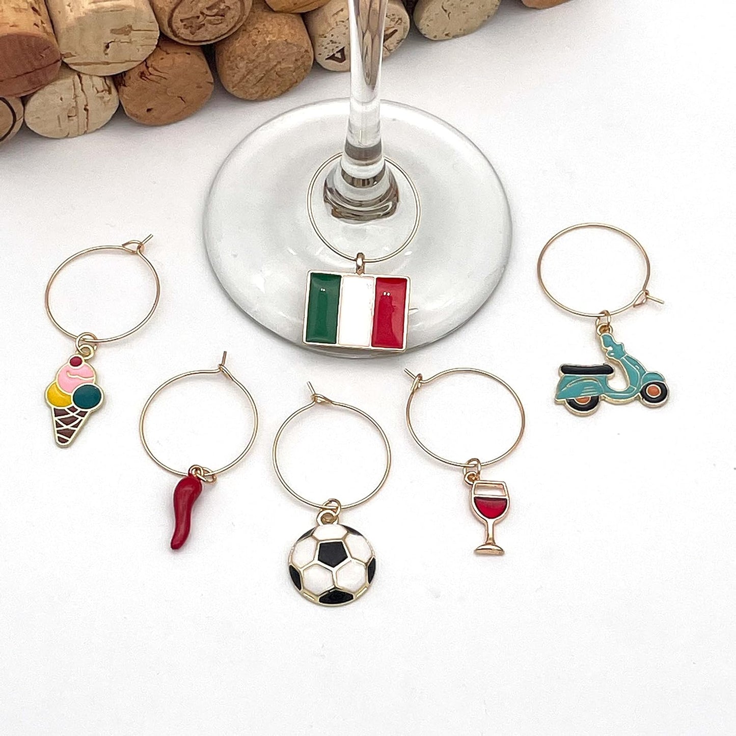 Italian Wine Charms set includes Italian Flag, Vespa, Soccer Ball, Gelato, Red Wine Glass, and Italian Horn hooked on the glass