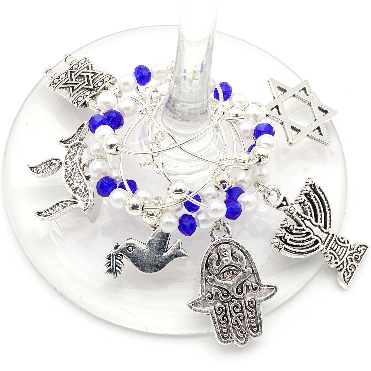 Jewish Wine Charms hooked on the glass.