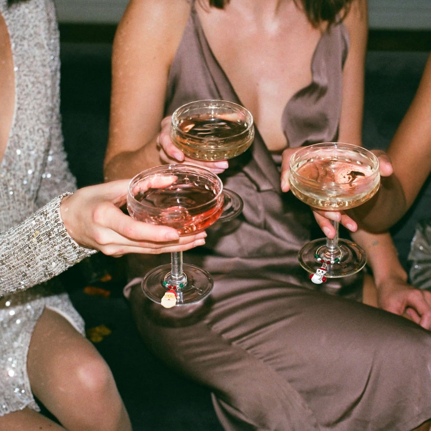 Girls celebrate and toast to Christmas with Wine Charms.