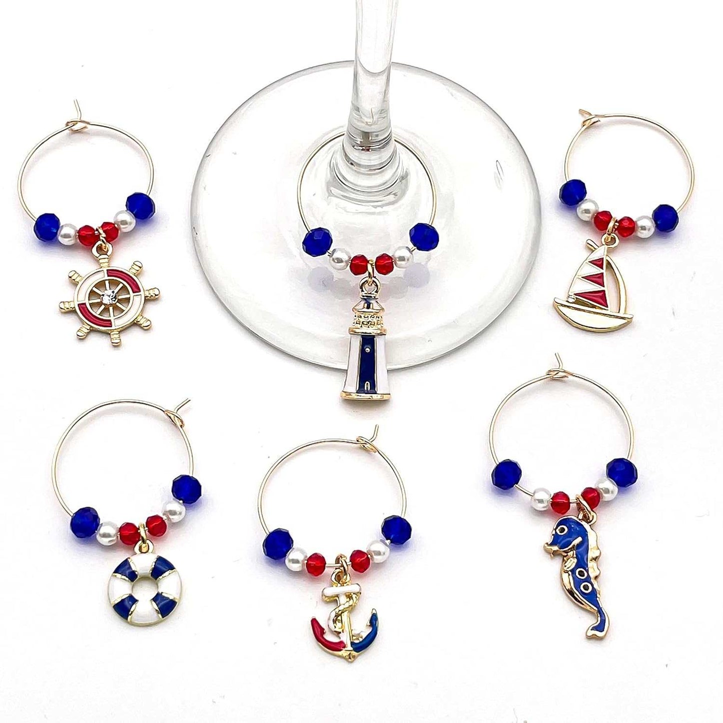 Nautical Wine Charms with Shells on a white surface