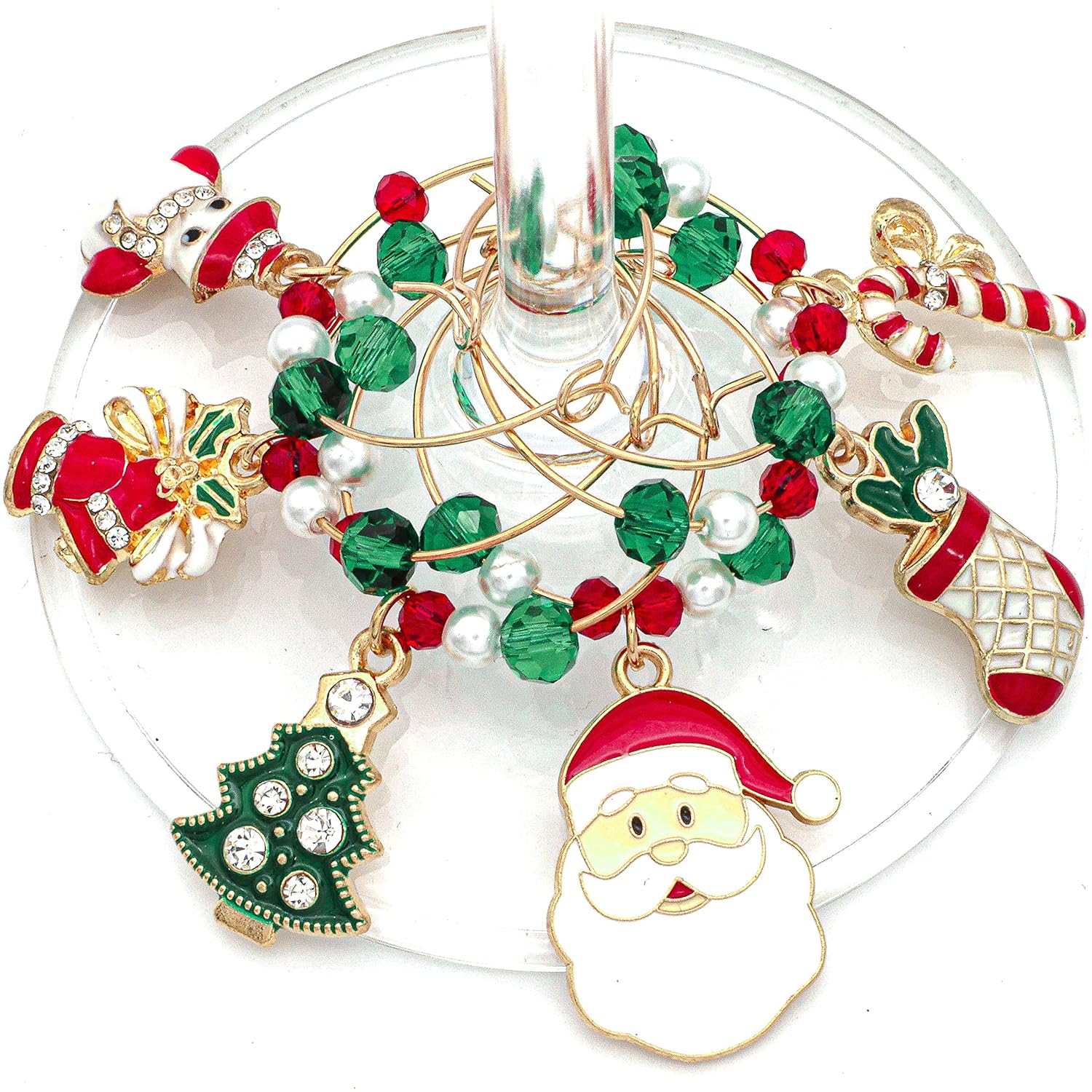 A set of Christmas Wine Charms featuring including Santa, Candy Cane, Snowman, Christmas Bells, Stocking, and Christmas Tree hooked on the wine glass.