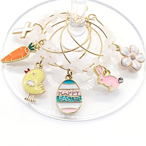 A set of Easter Wine Charms featuring Bunny, Egg, Cross, Carrot, Chick, and Daisy hooked on the glass.