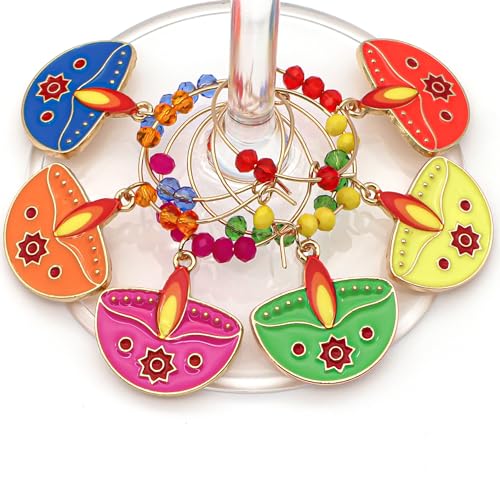 A colofrul set of Diwali Wine Charms hooked on the wine glass.