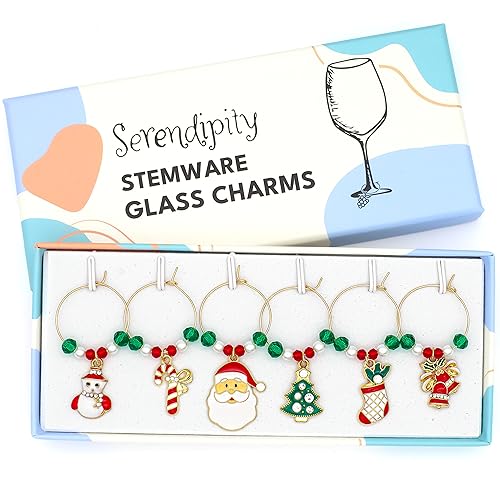 A set of Christmas Wine Charms featuring including Santa, Candy Cane, Snowman, Christmas Bells, Stocking, and Christmas Tree in the brand's box.