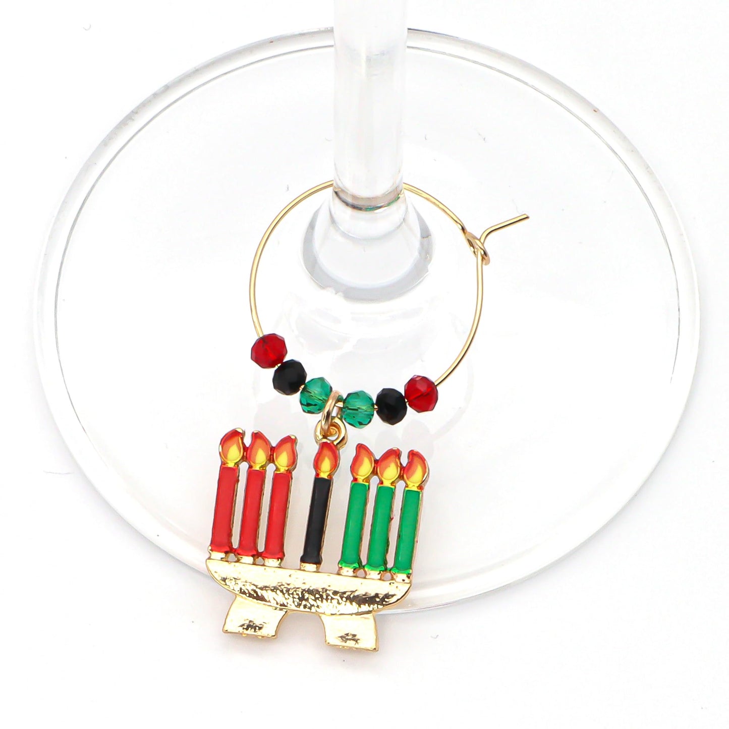 Kwanzaa Wine Charms hooked on the glass