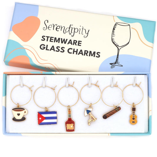 A set of Cuba Wine Charms featuring flag, cigar, sunbed, rum, guitar and coffee packaged in a gift box.