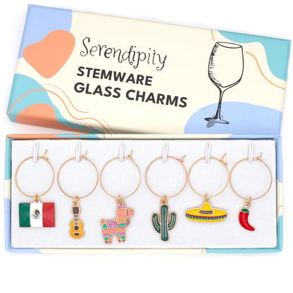 A set of Mexico Wine Charms featuring  Piñata, Mexican Flag, Chili Pepper, Cactus, Guitar, and Sombrero in the brand's box.