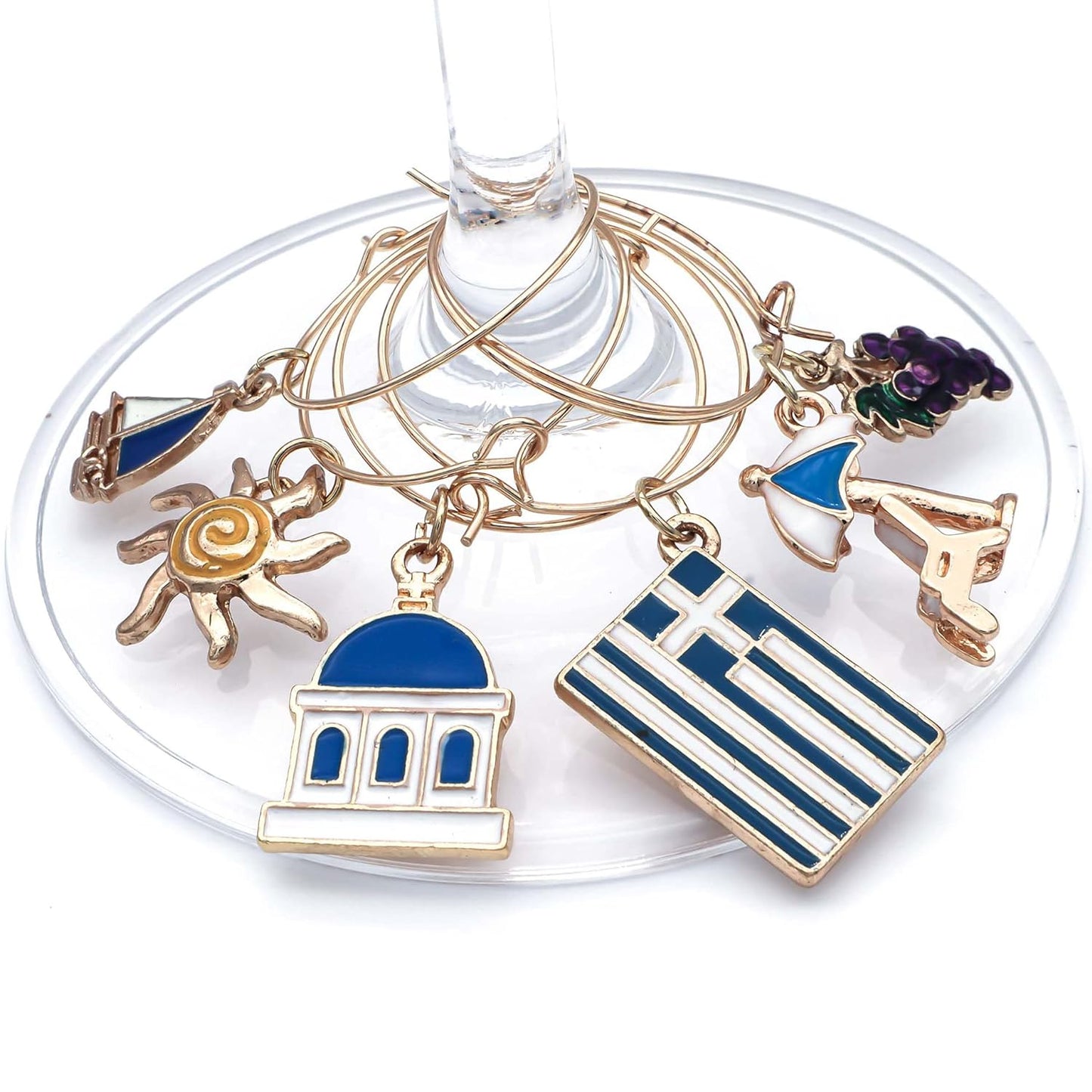 Greek Wine Charms hooked on the glass.