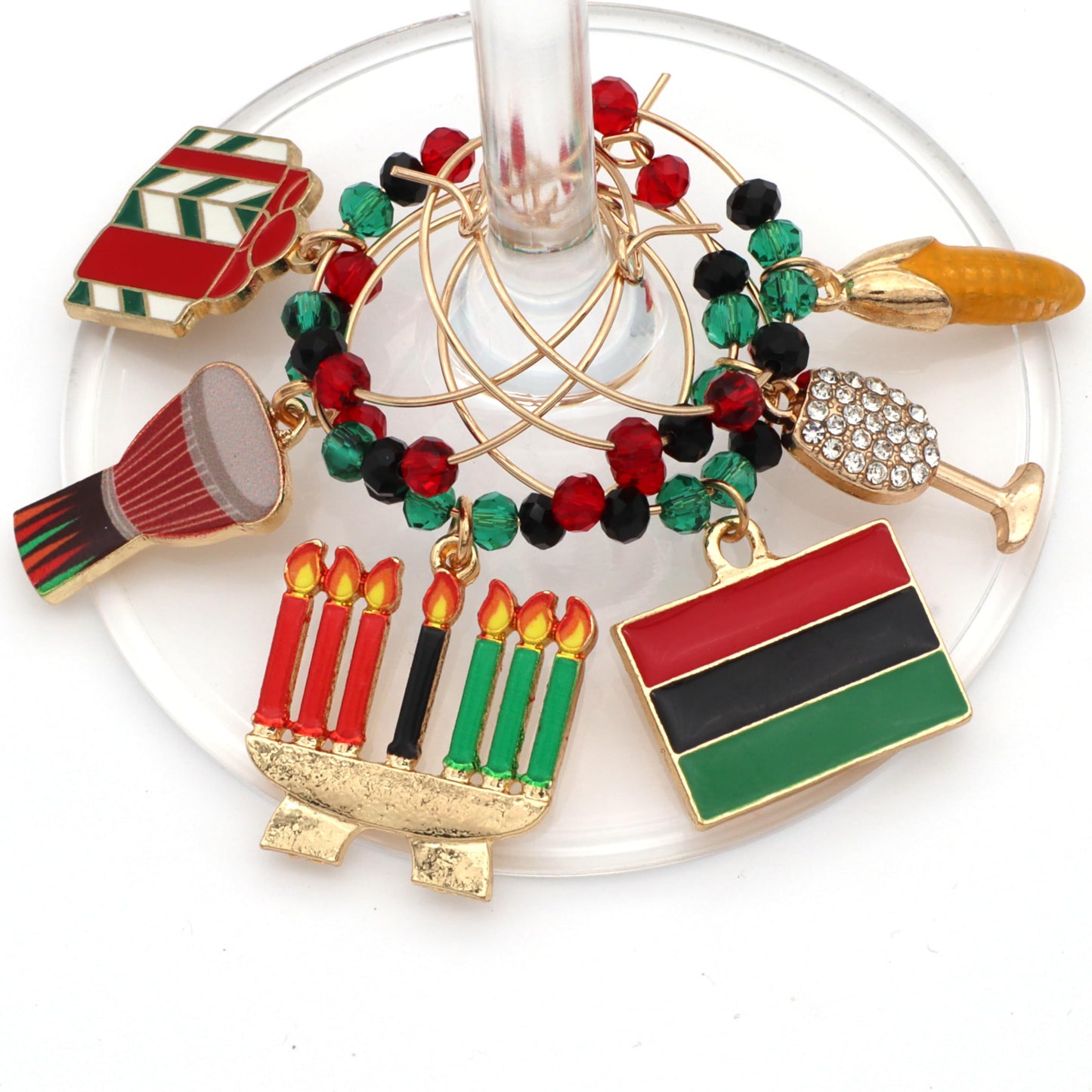 Kwanzaa Wine Charms hooked on the glass